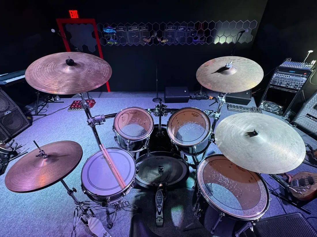 Drummer’s view of the stage kit, cymbals and monitors